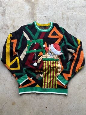 Blizzard Bay multicoloured Christmas sweater with Santa Claus and cat design.